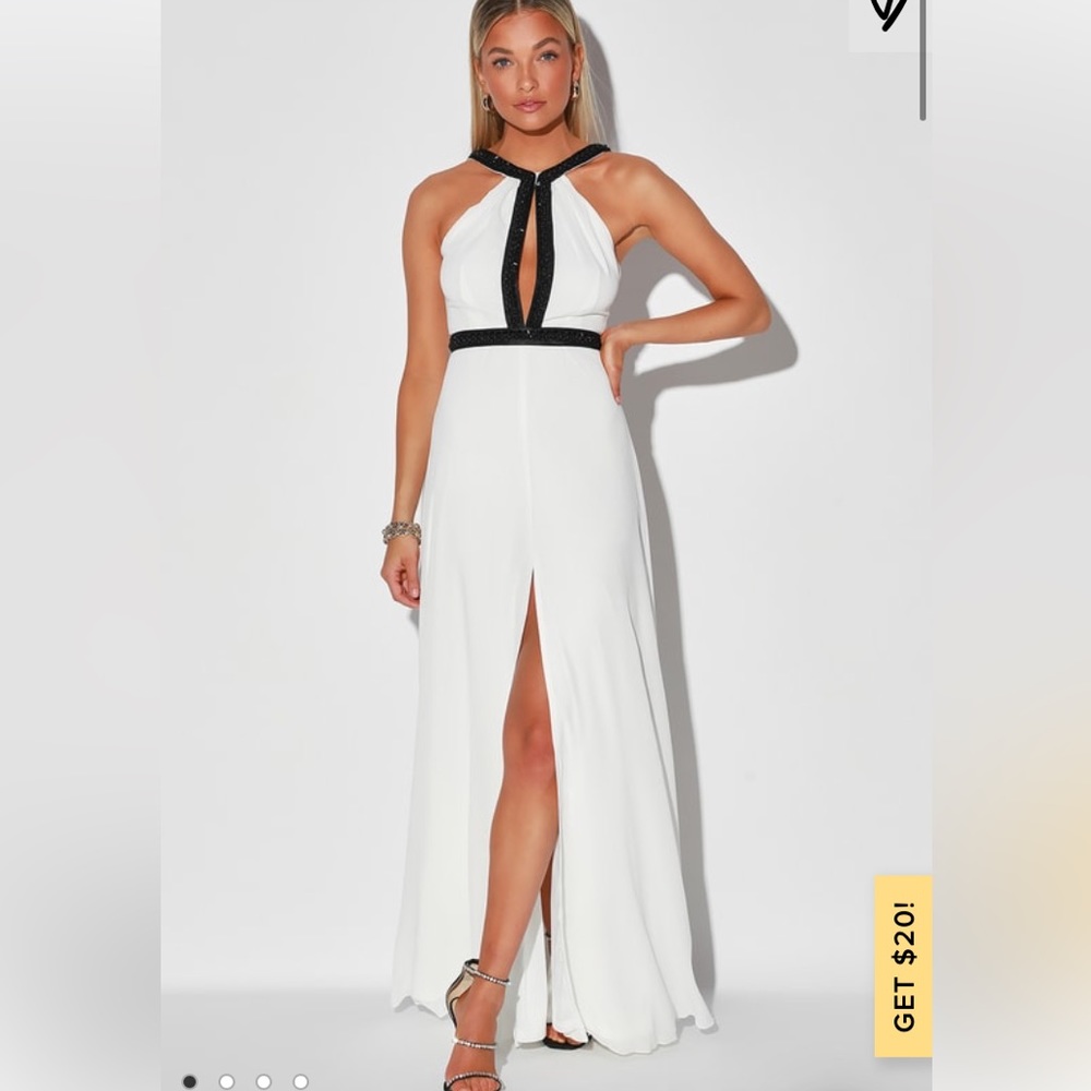 White keyhole slit dress with black beaded design